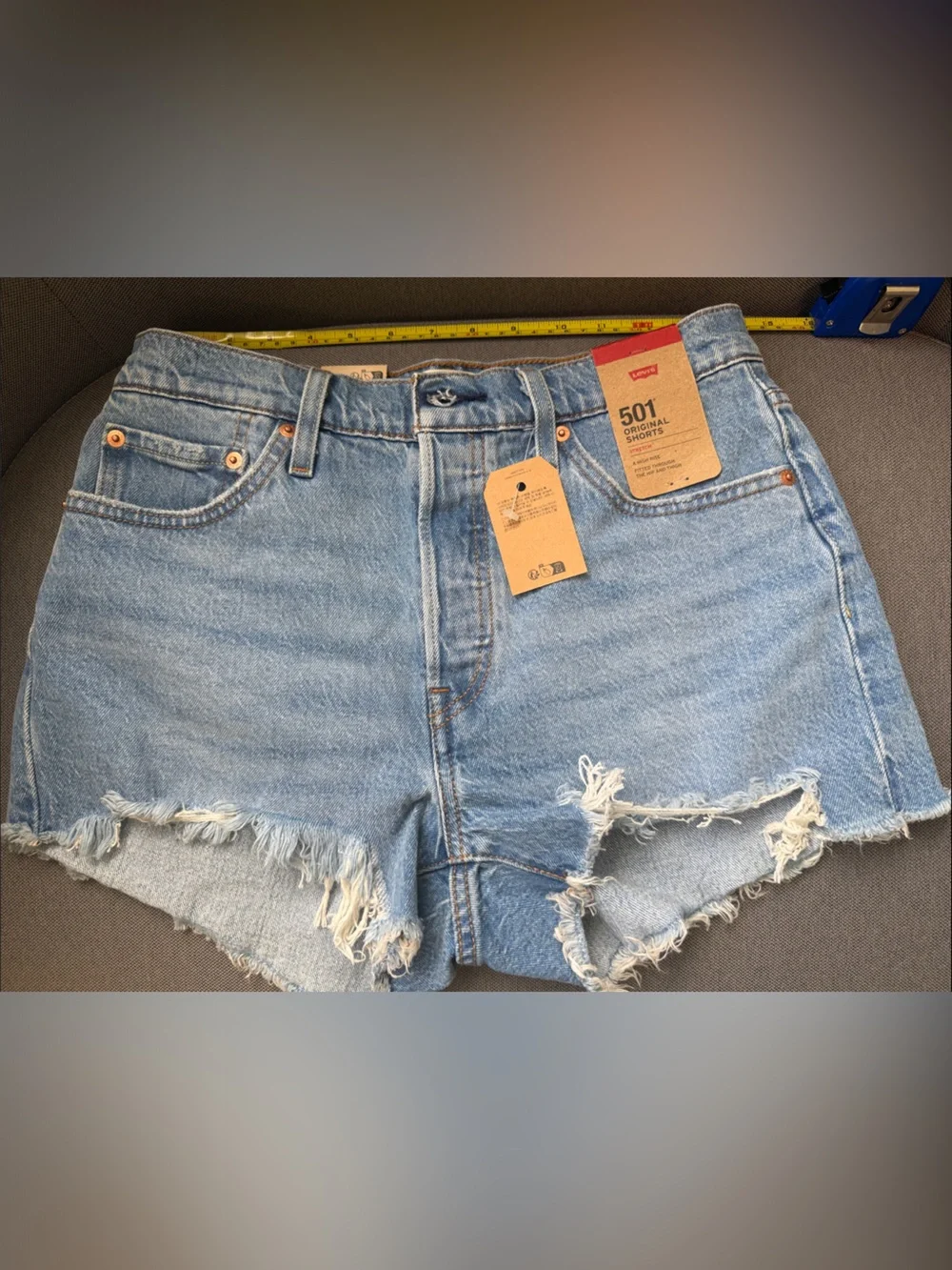 Levi's Light Blue Frayed Hem Denim Shorts - Picture 1 of 7